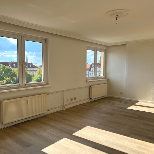 Lichtdurchflutete Dachgeschosswohnung mit Heidensee-Blick und neuer Einbauküche in 19055 Schwerin - Photo 1