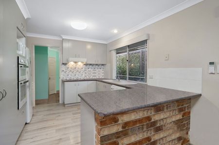 PERFECT FAMILY LIVING WITH CHARACTER BRICK CHARM & SOLAR SAVINGS! - Photo 4