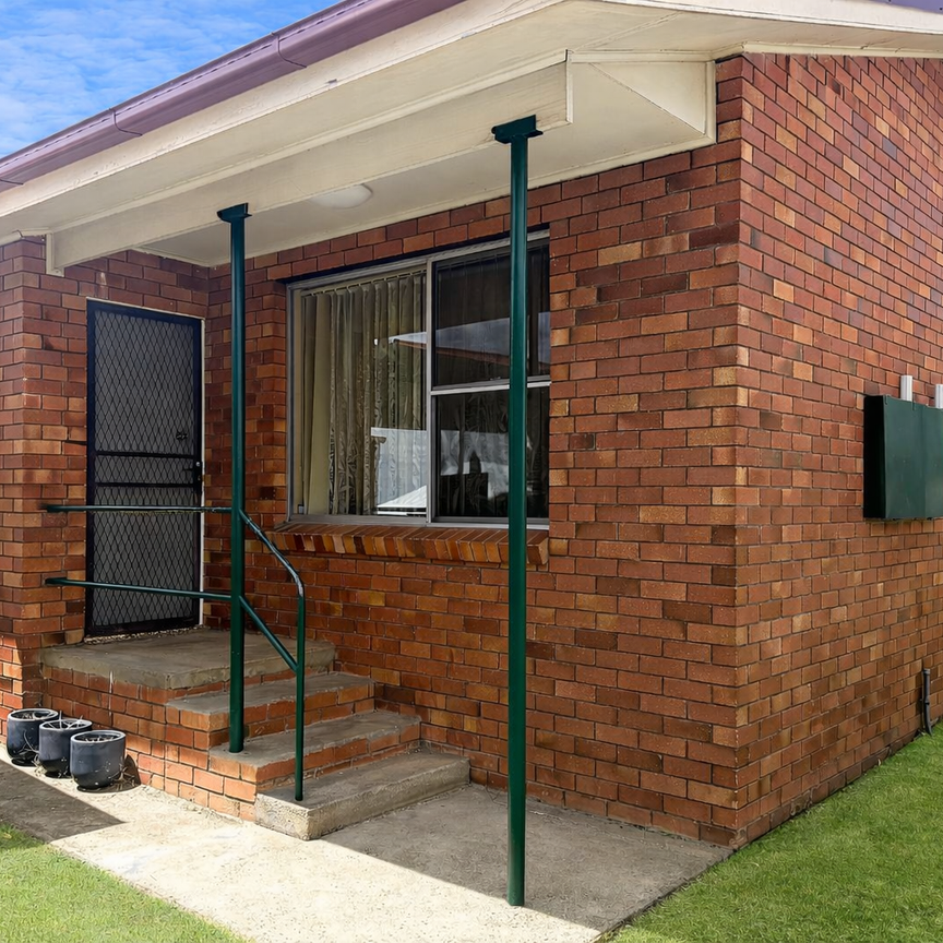 Neat Two Bedroom Unit - Photo 2