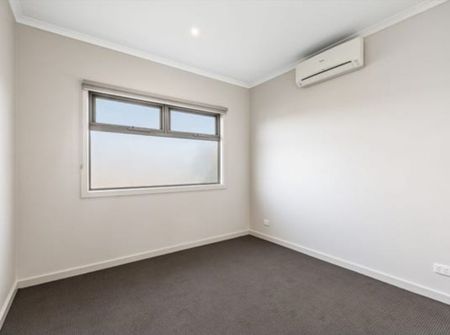 Conveniently located modern four bedroom townhouse - Photo 3