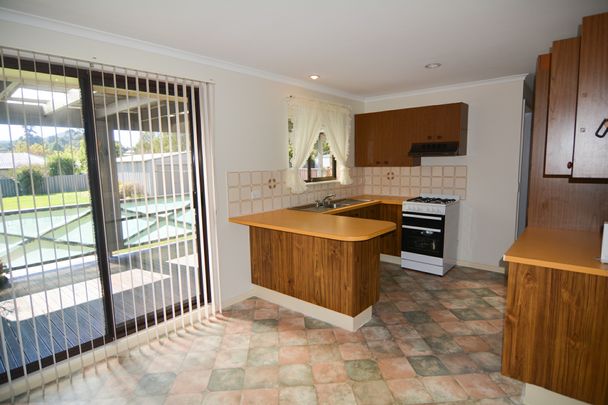 NEAT FAMILY HOME - Photo 1