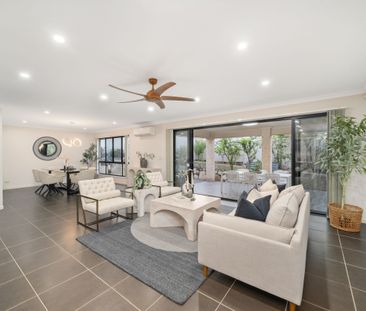 MODERN HOME WITH MULTIPLE LIVING AREAS + SOLAR - Photo 2