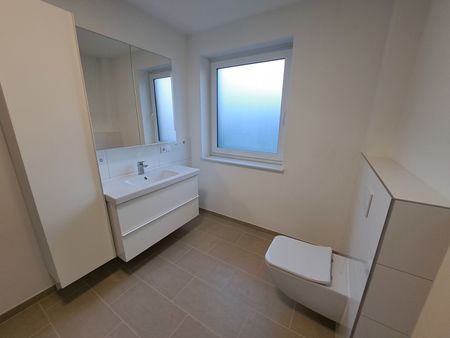 Energieeffiziente Erdgeschosswohnung mit Garten und Einbauküche - Photo 5