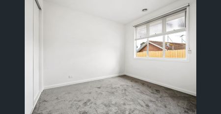 Modern Two-Bedroom Home in a Convenient Location - Photo 4