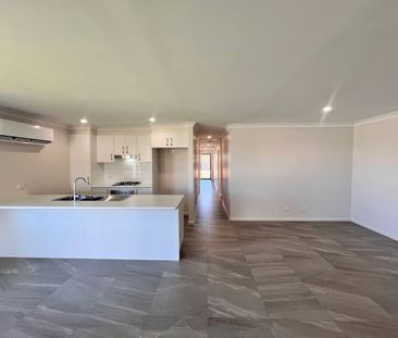 NEAR NEW 4 BEDROOM HOME - Photo 5