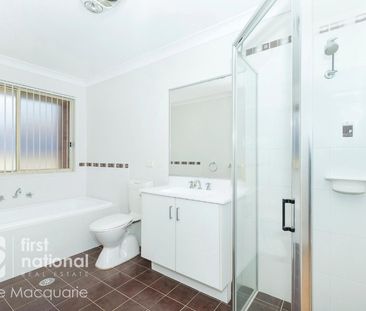 Charming and Spacious 4-Bedroom Home - Photo 6