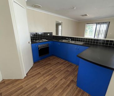 CLOSE TO SCHOOLS & SPORTS CENTRE, LARGE BACK YARD! - Photo 5