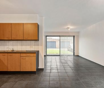 Gelijkvloers appartement met 2 slpks, tuin en garagebox - Photo 1