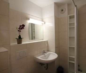 Modernes und möbliertes Apartment in zentraler Wohnlage mit kleinem Spa-Angebot! - Photo 1