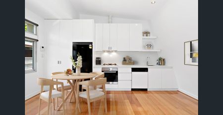 Modern Two-Bedroom Townhouse with Balcony and Secure Garage - Photo 5