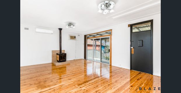 Three Bedroom Home with Character and Comfort! - Photo 1