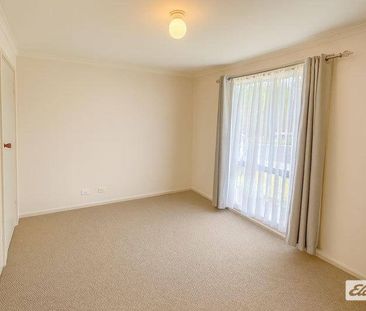 Freshly updated and low maintenance living - Photo 3