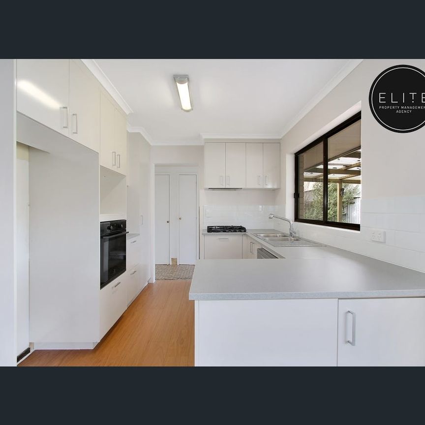 NEAT HOME IN QUIET COURT - Photo 1