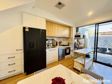 Stylish Low-Maintenance Living Near City & Beach - Photo 4