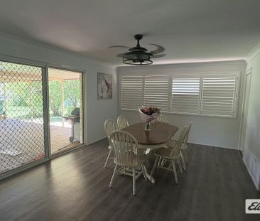 NEW TO THE RENTAL MARKET – SPACIOUS 4-BEDROOM BRICK HOME ON ¾ ACRE - Photo 2