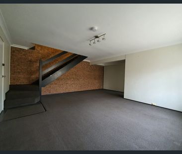 Two Bedroom Townhouse With Air Conditioning - Photo 2