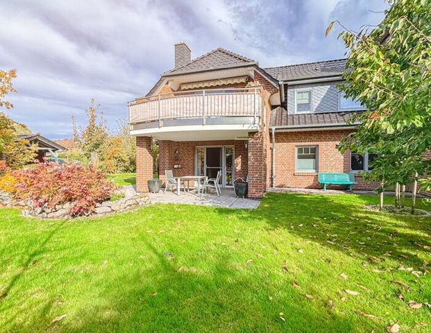 Moderne 3-Zimmer- Wohnung mit Garten und großem Carport - Foto 1