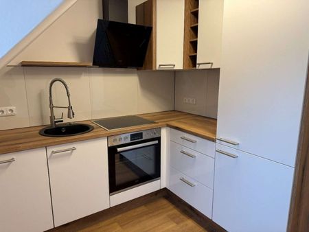 Erstbezug nach Sanierung! 2-Zimmer Dachgeschosswohnung mitten drin! - Foto 2