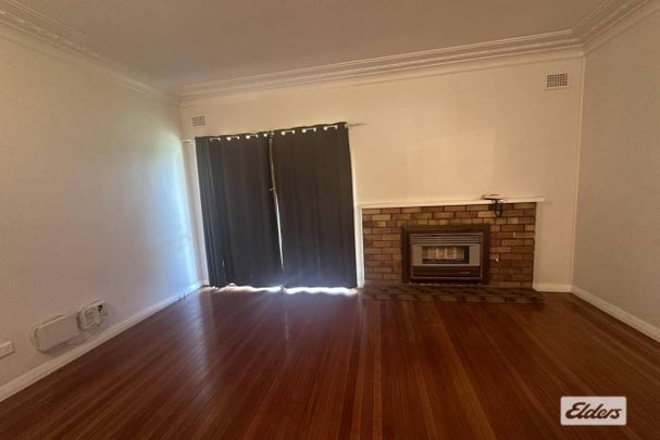 Family home in Taree West - Photo 1