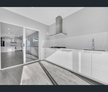 Spacious Family Living with Exceptional Comfort & Space - Photo 6