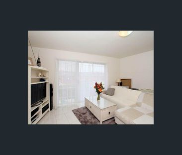 Spacious Apartment with Courtyard, Carport, and Ultimate Convenience - Photo 1