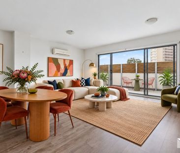 Top-Floor Living with Space, Style & Convenience - Photo 3