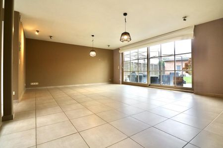 Ruime, energiezuinige woning met 2 slpk, garage, patio, tuin en terras voor 1.095 EUR/mnd - Photo 5