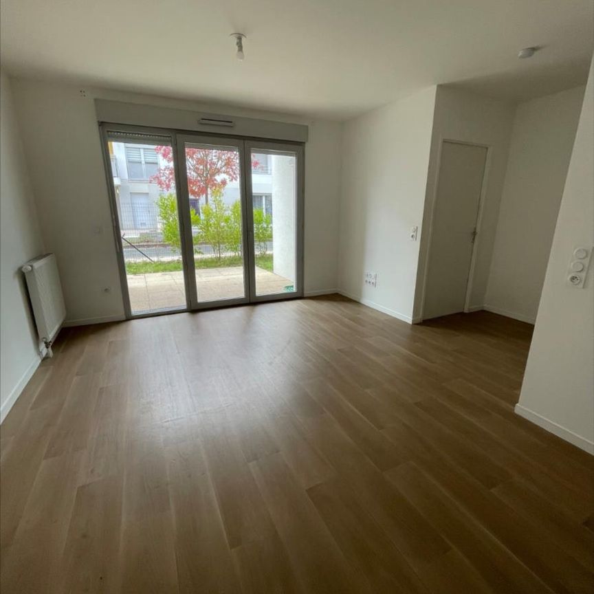 Résidence récente - F2 en RDC avec terrasse et parking - Photo 1