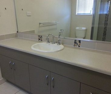 Spacious Four-Bedroom Home with Fully Fenced Yard in Bohle Plains! - Photo 6