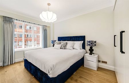 A beautifully presented two bedroom flat situated on the first floor of this well run portered block on Kensington High Street moments away from the green spaces of Holland Park too. EPC rating: D - Photo 5