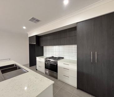 Brand-New 4-Bed Home with Theatre & Study - Photo 6