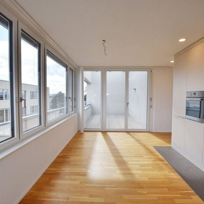 Modern 3.5-room apartment with balcony at the Lyss train station - Photo 1