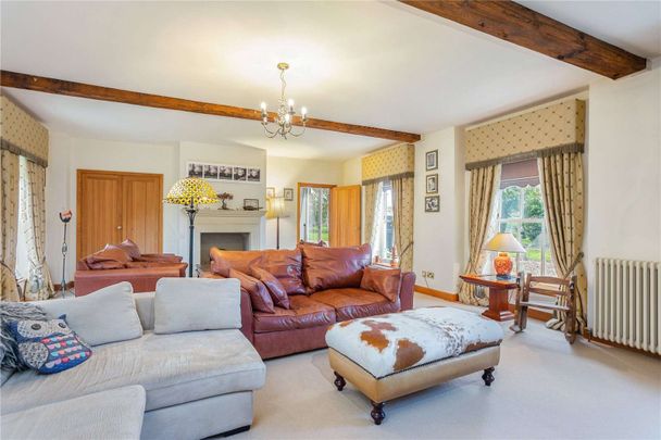 An extensive former coach house to rent with secondary accommodation, garaging, extensive outbuildings and an indoor pool at Speen near Newbury. - Photo 1