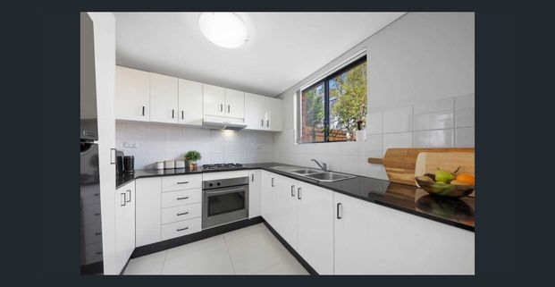 EXCEPTIONAL 2 BEDROOM TOWNHOUSE - Photo 1