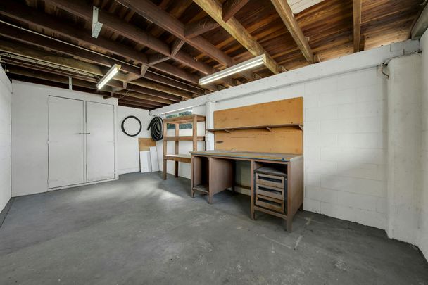 Spacious Family Home with Pool and plenty of Storage - Photo 1