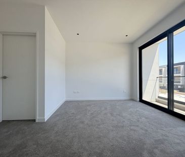 Spacious Three-Level Townhouse with Workshop & Dual Outdoor Living - Photo 3