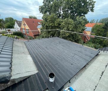 Schöne Dachgeschosswohnung mit großer Terrasse - Photo 1