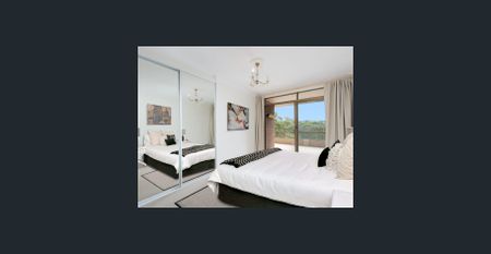 Sleek Two Bedroom Apartment - Photo 2