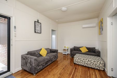 Convenient Villa Living in Quiet Complex of Four - Photo 2