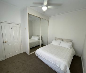 Stylishly Renovated Gem in a Prime Central Location - Photo 4