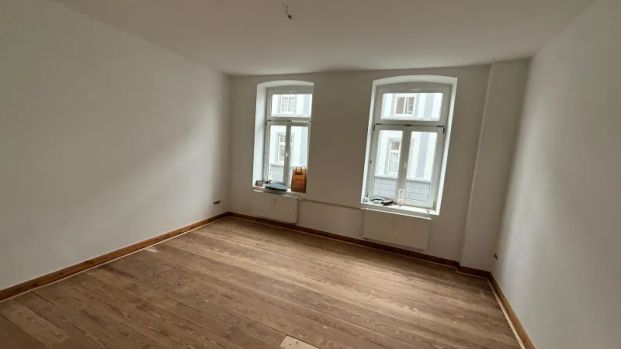 Erstbezug nach Sanierung: Exklusive 3 Zimmer-Wohnung mit Balkon, Dielen und Kaminanschluss! - Photo 1