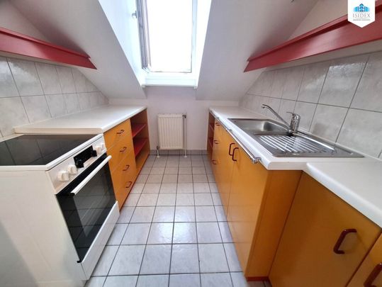 Dachgeschosswohnung in großartiger Lage - Foto 1