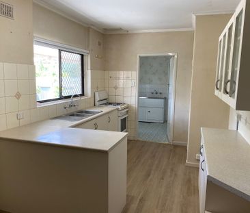 Comfortable Family Home with Generous Yard! - Photo 6