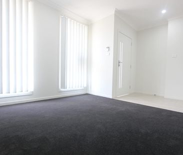 BRAND NEW QUALITY 4 BEDROOM HOME - Photo 1