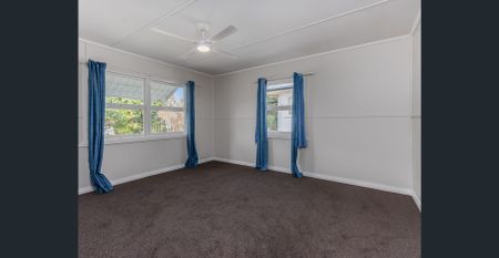 Elevated Family Home with Space, Storage & Street Appeal - Photo 4