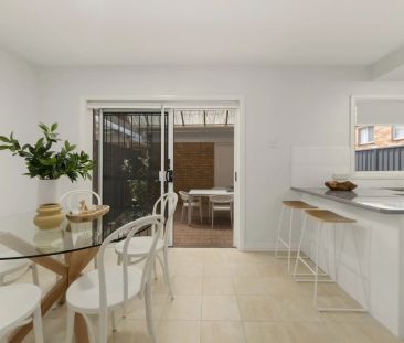 Exclusive Three Bedroom and 1.5 Bathroom Townhouse - An Exemplary R... - Photo 5