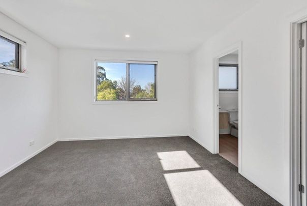 Stylish, Spacious & Ideally Located Townhouse - Photo 1