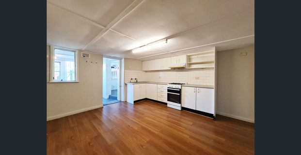 DOUBLE-FRONTED COLONIAL-STYLE TWO-LEVEL HOME - Photo 1