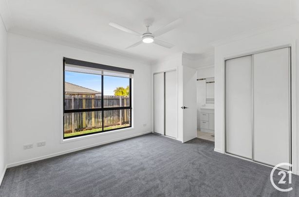 Stylish & Spacious Family Home in Prime Collingwood Park Location - Photo 1