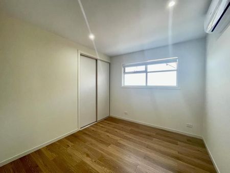 Modern 3-Bedroom Home with Abundant Natural Light - Photo 2